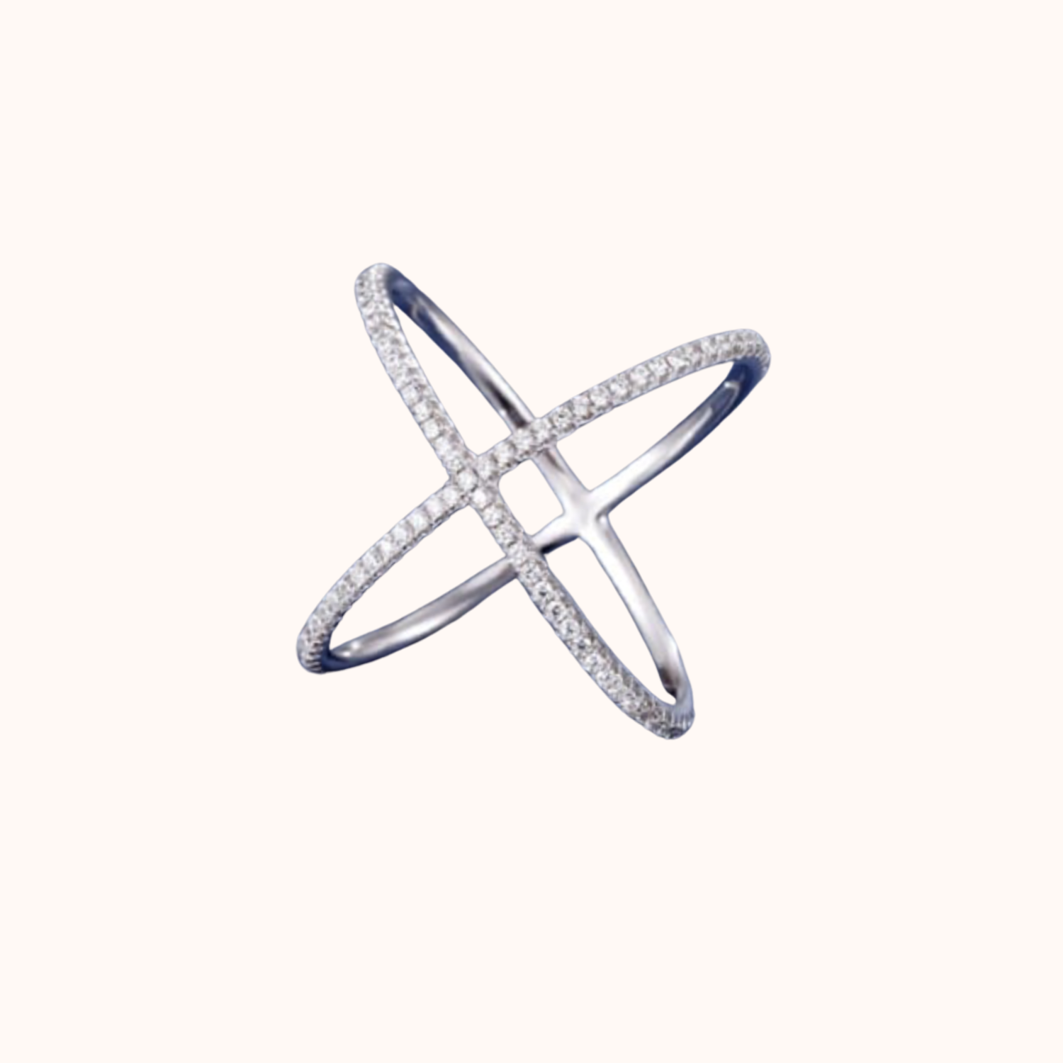 Cubic zirconia cross ring on white background