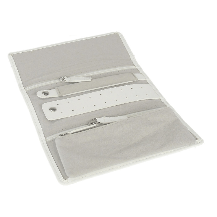 White travel jewellery wallet unfolded, revealing organised storage compartments for rings, earrings, necklaces, and accessories