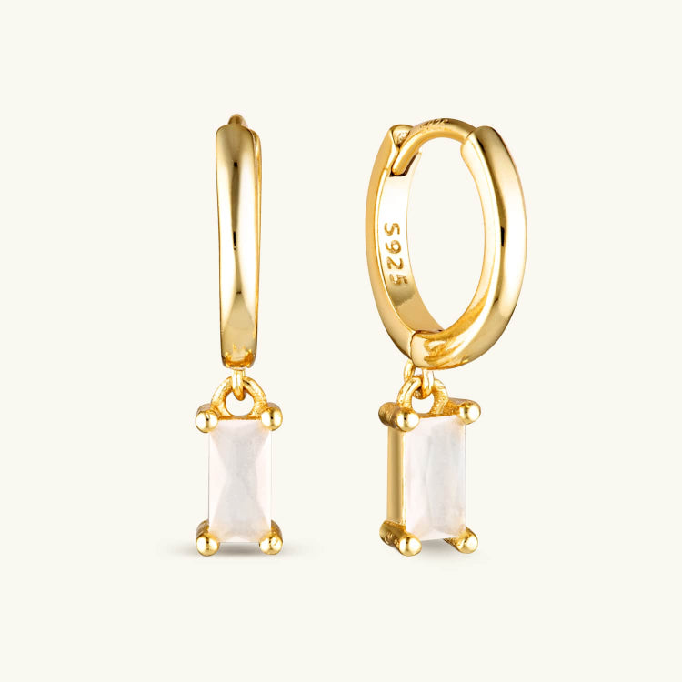 Zephyr Huggie Earrings with a sleek geometric drop design made in sterling silver with gold plating. A modern statement piece with effortless movement