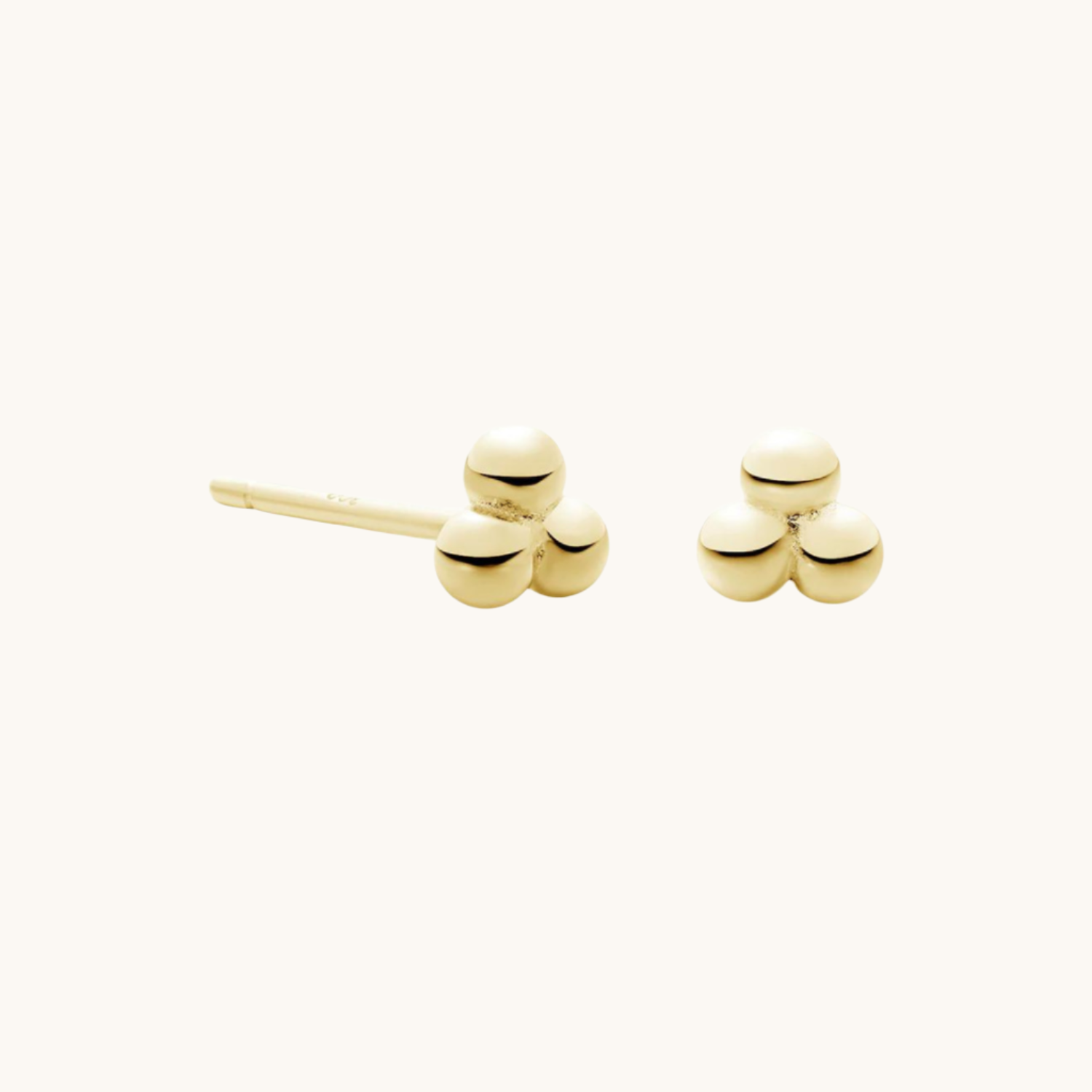 Gold three-ball cluster sphere earrings with a chic, modern design. A timeless and versatile accessory, perfect for elevating any outfit with elegance