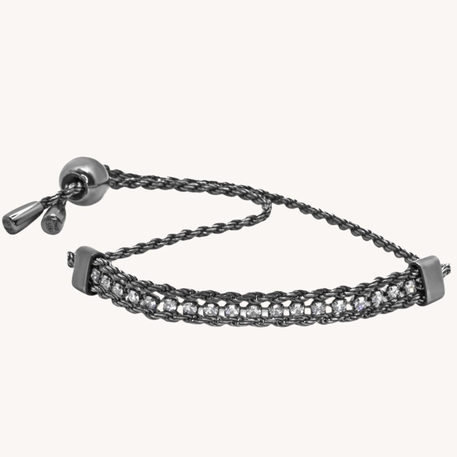 Black tennis bracelet with knotted chain links and cubic zirconia accents.